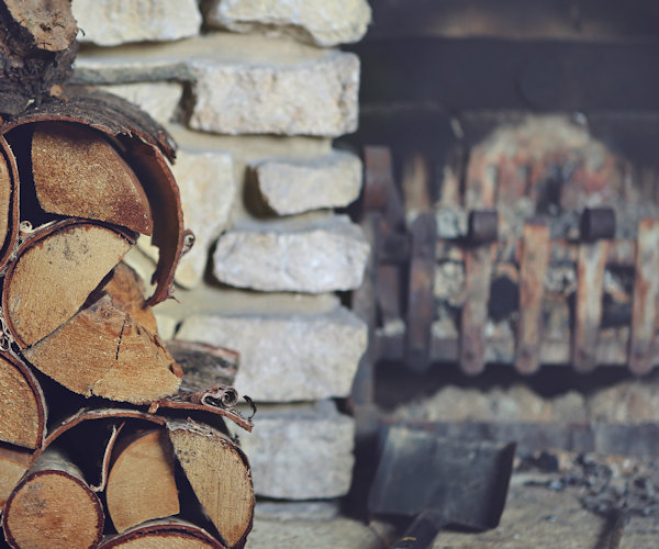 Wood log fire used for chimney sweep web design